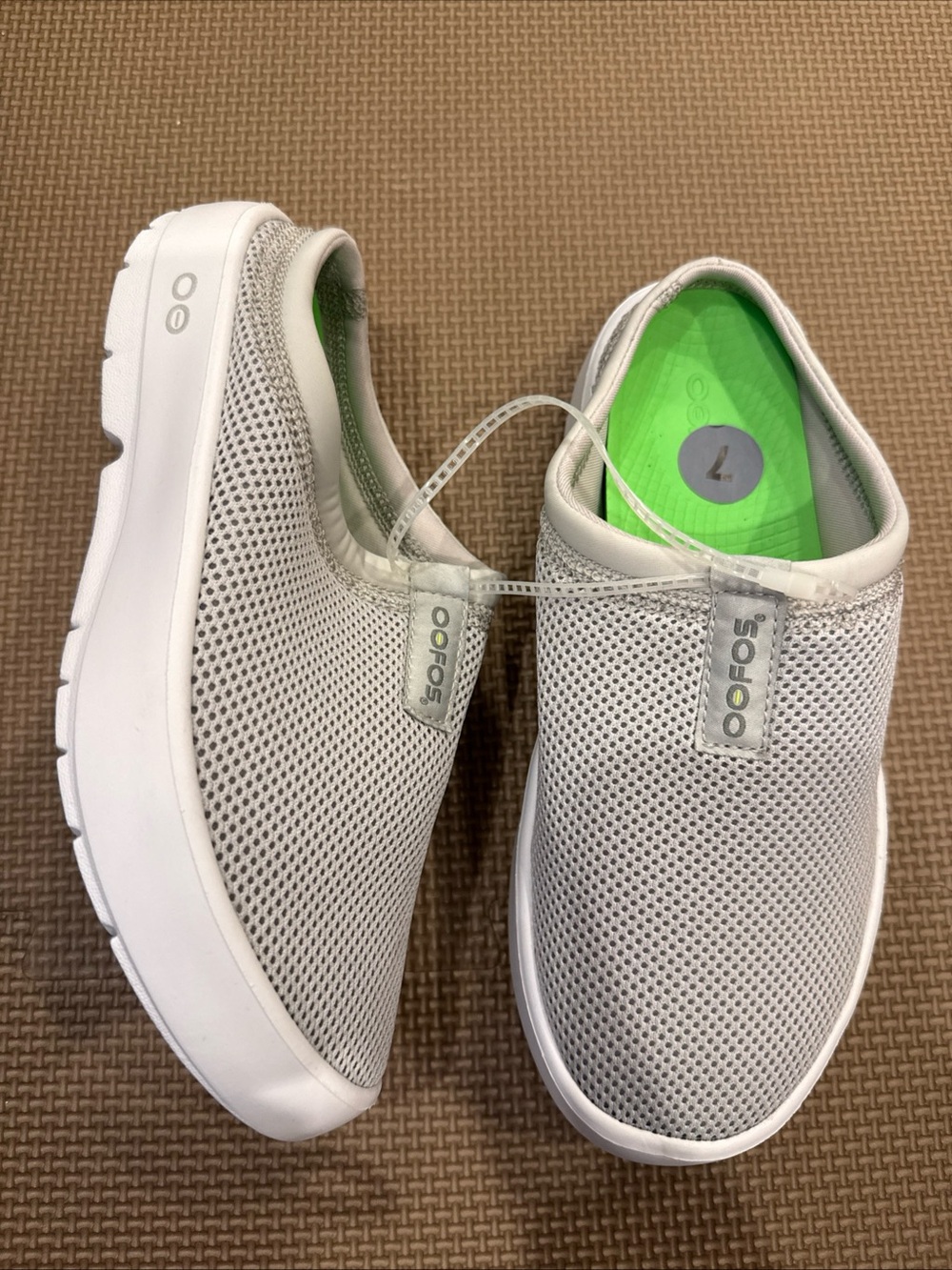 OOFOS Women’s White Slip-On Mesh Comfort Sneakers with Green Insole